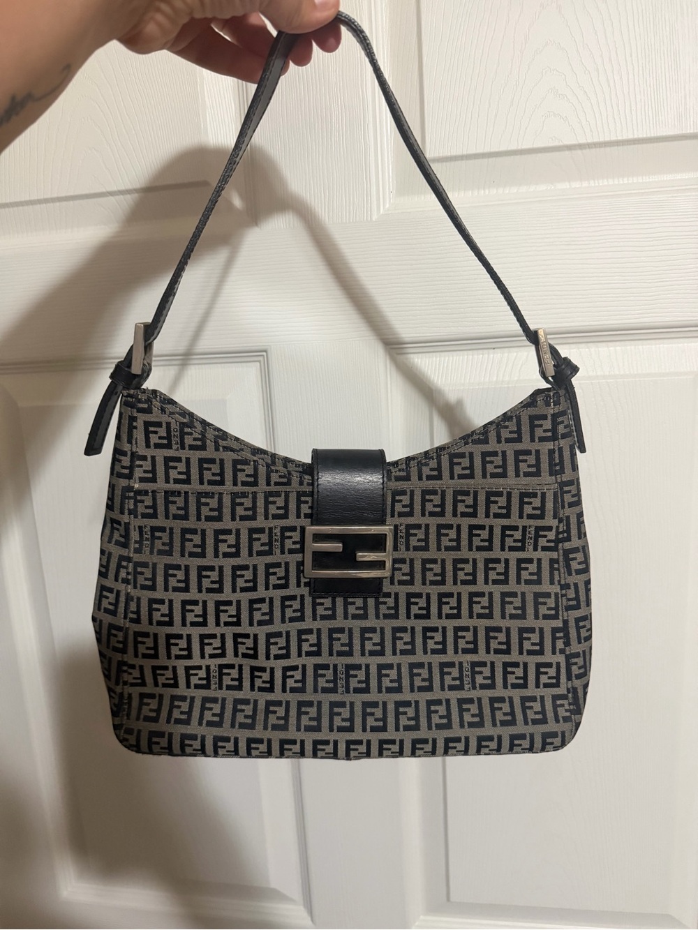 Shoulder bag with blue monograms